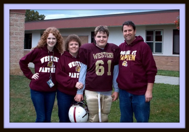 Lori Kittinger: I don't know if this is something you can use or not, but as a family we are all proud of Josh playing middle school football. The kids started with a week long camp, weight lifting then after school practice...this has been a constant since July.  Josh did great & got into shape working out once school started 10 hours a week.   I was VERY nervous for him to play, but he REALLY wanted to.  He only had a few small injuries so I am learning to just relax.   Anyway, here is the family picture one of Josh's friends was nice enough to take of us after his final game.   By the way, he had 9 tackles for the season & they had a winning season 3-2.  Two of the games the other team didn't even score.  If you decide to use this please rewrite it, I don't have your flare.  ha ha   :) 